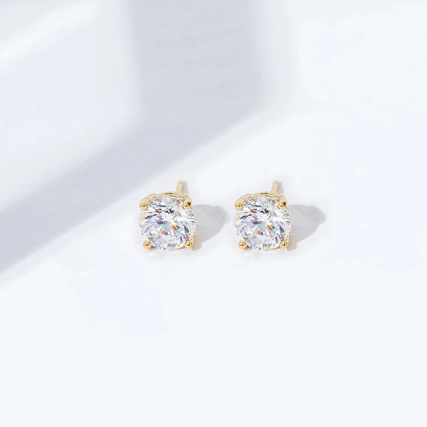 Amazon Essentials Yellow Gold Plated, Platinum or Rose Gold Plated Sterling Silver Infinite Elements Cubic Zirconia Stud Earrings | White, Blue, Green, or Pink Cubic Zirconia (previously Amazon Collection)